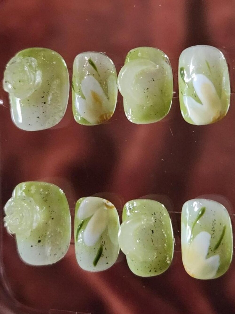 1.0 Short green &  white floral press-on nails with moon & rose 3D designs.